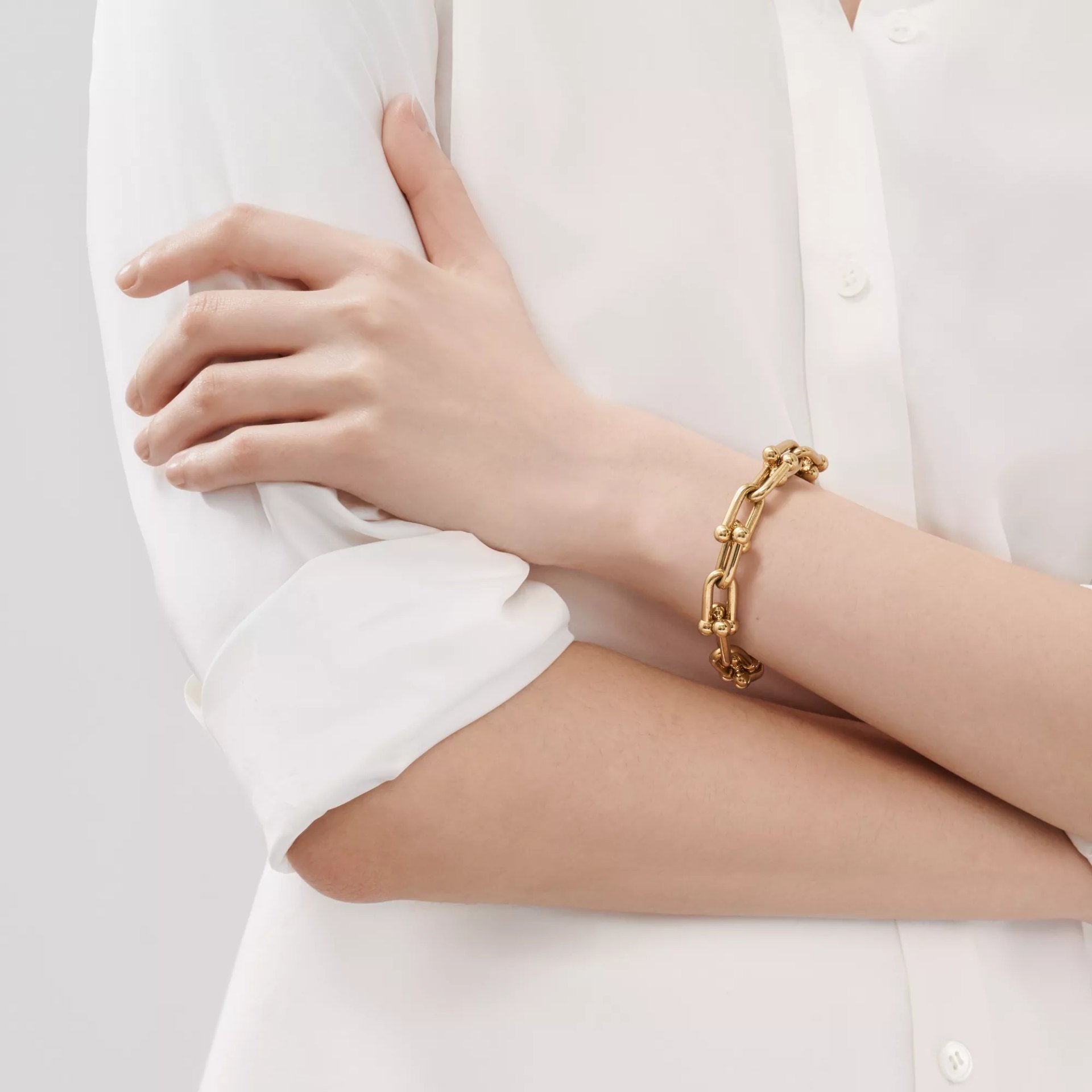 Diamond bracelets arranged as a balanced wrist stack
